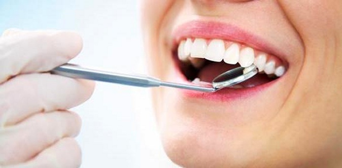 Чистка зубов, отбеливание, лечение кариеса с установкой пломбы от стоматологической клиники «Новое время».