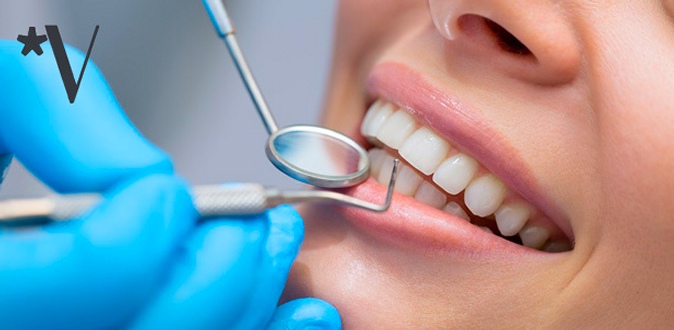 УЗ-чистка зубов, лечение кариеса с установкой светоотверждаемой пломбы или экспресс-отбеливание Amazing White в стоматологии «Пять звезд».