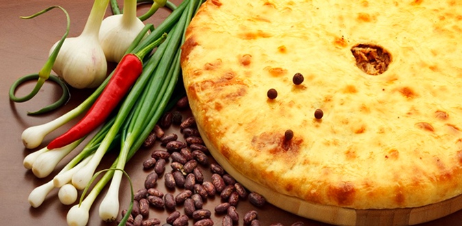 Скидка до 69% на вкусные осетинские пироги и горячую пиццу с бесплатной доставкой от пекарни «Дар Аланов»